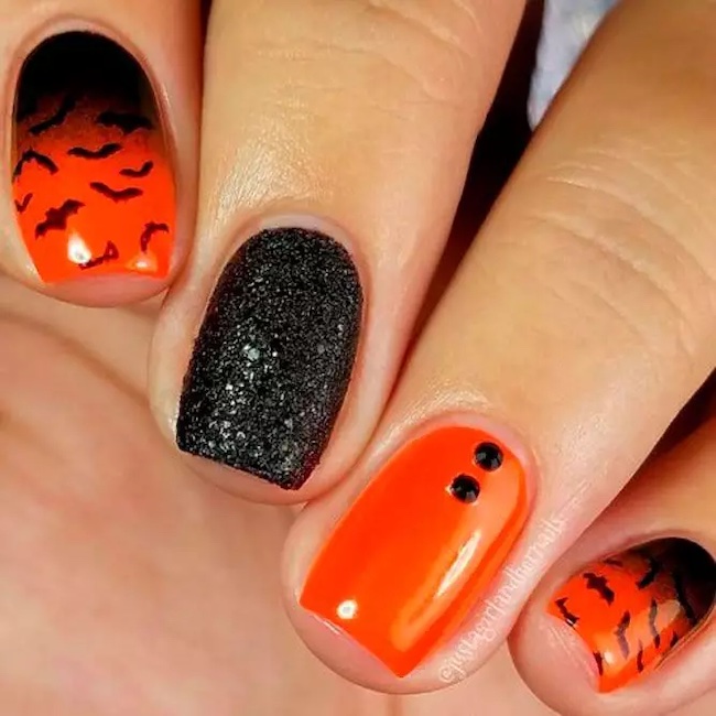 Halloween nails black ombre bats orange
